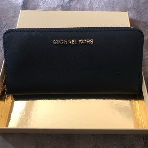 NWT Michael Kors black travel zip around wallet
